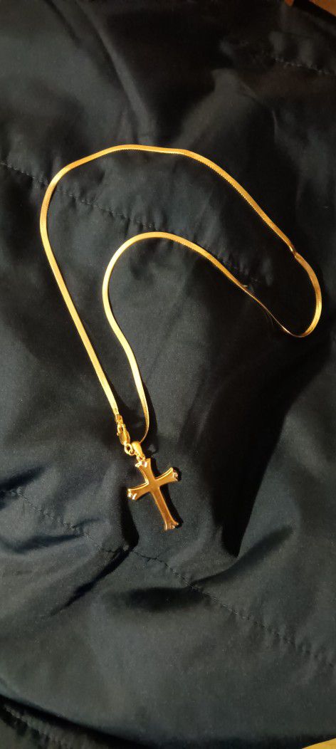 A 14k Chain W/ Gold Cross Over Sterling Silver.