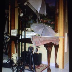 Sombrilla con sus luces soportes tripod luces todo para que funsiona con tu flash de tu camara el equipped de photografia