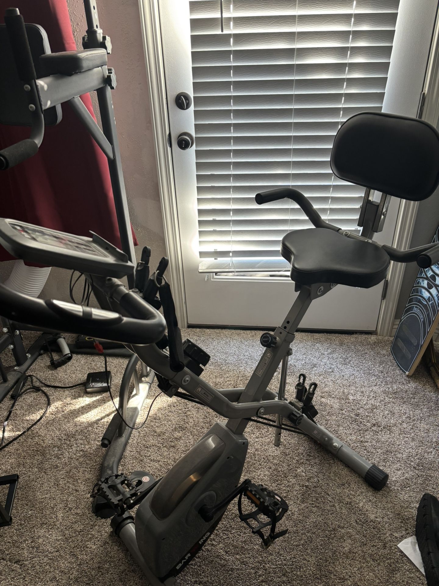 Stationary Bike With Arm Strengthening And Leg Resistance