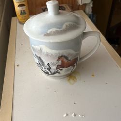 Nice coffee mug has Chinese on the bottom