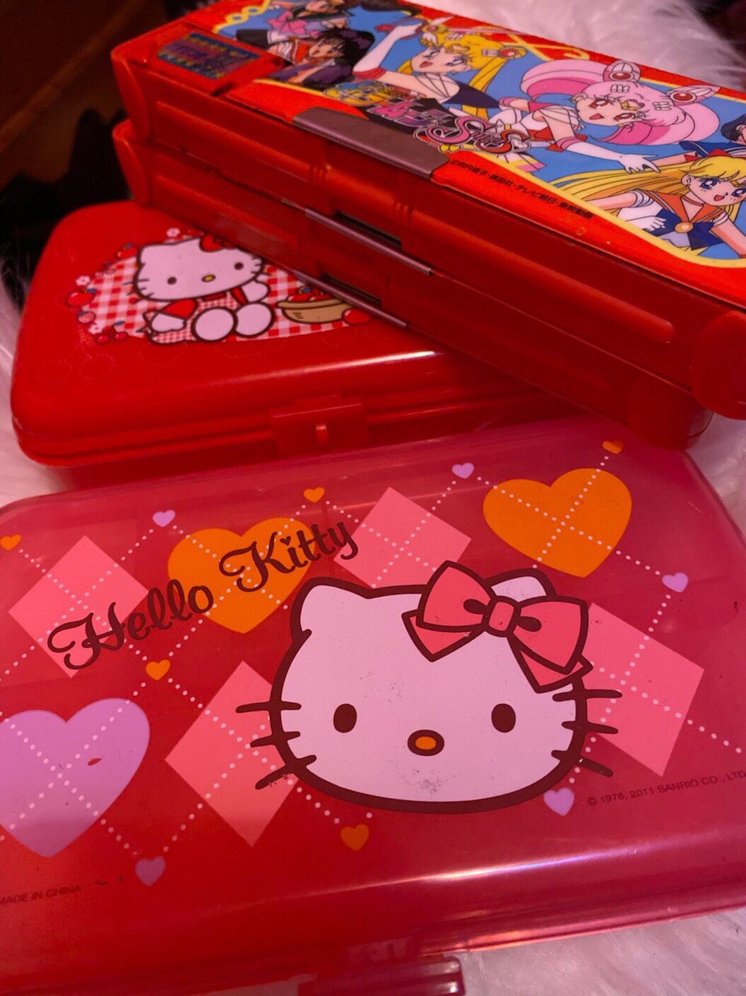 Hello kitty pencil boxes and sailor moon