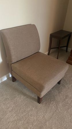 Tan upholstered side chair