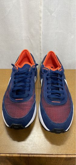 I had a pair of Nike Waffle trainers in size 6Y (children’s) and 7.5 (women’s) in blue and orange
