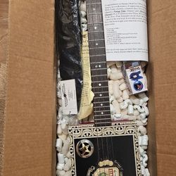Unique 4-String Cigar Box Guitar & Amp