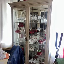 Empty glass cabinet (dishes not included )