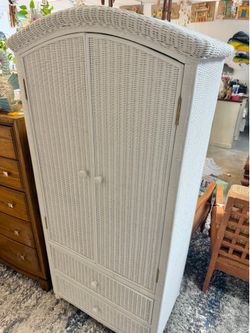 Vintage wicker armoire