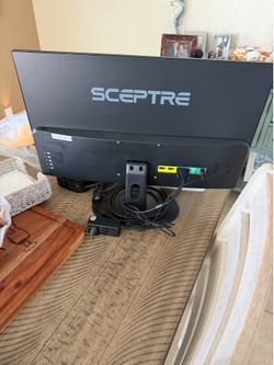 Sceptre 22” E 24 monitor HDMI 75H2. Son in law used for one week. Like new.