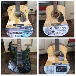 4 autographed guitars