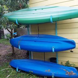 Three Kayaks W/ Stand