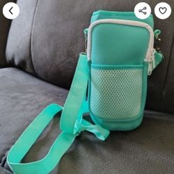 NEW, Tumbler Holder W/ Adjustable Strap, Zipper Compartment. See Photos. Cash And Pickup Only 