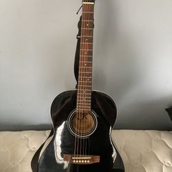 j. reynolds’s guitar with bag . Black original strings and belt 