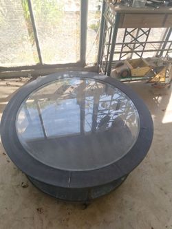 Round glass and wood coffee table