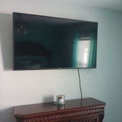 LG 50in TV with wall mount included
