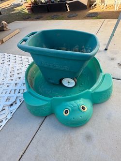 $20 Small garden wheel barrel, $5 Green turtle pool or sand box