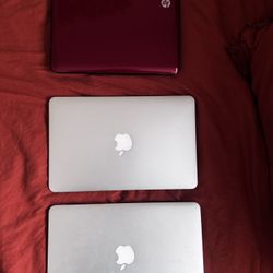 2 MacBook And 1 HP Laptop 