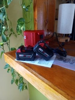 Milwaukee 18 V New. Batteries.  3.0 AH.  Lithium.  Charger
