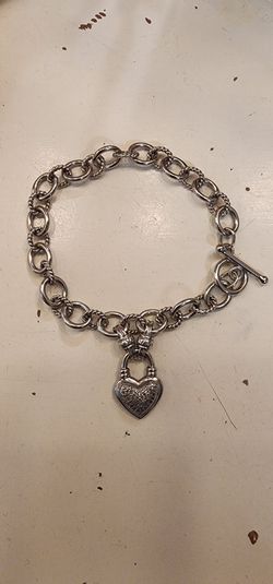 1/4 CT. T.W. Diamond Heart Charm Bracelet in Sterling Silver