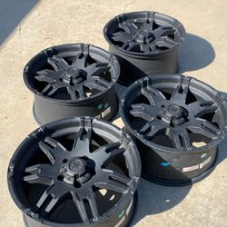 Black 18x9 cast aluminum rims