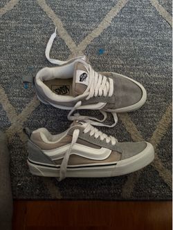 Gray and white Vans Knu Skool