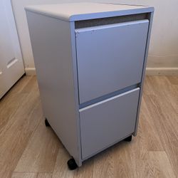 WOOD CABINET ON WHEELS.   $85.