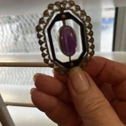 Beautiful Antique  Brooch. Perfect condition. Purple stone.