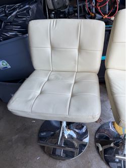4 ivory leather bar stools