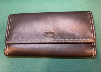 Vintage black leather Coach flap wallet with contrast stitching