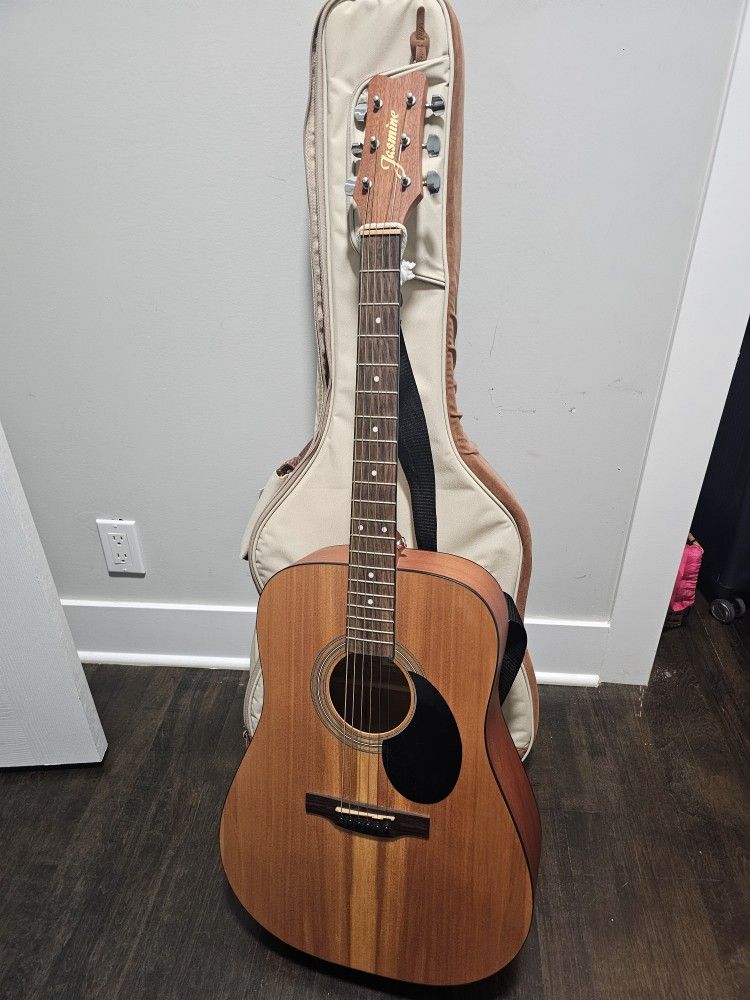 Acoustic Guitar And Case