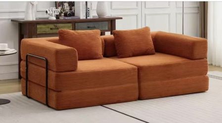 The double sofa, with its comfortable and soft design, is suitable for the living room.