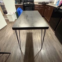 Dining table with hairpin legs
