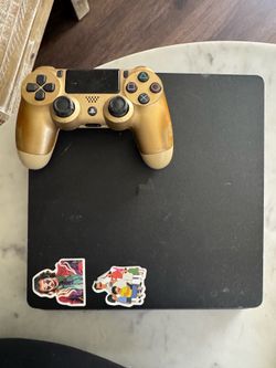 PS4 with controller and 4 games