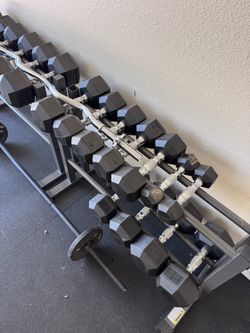 Rogue dumbbell set with racks