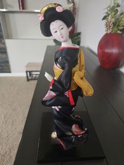Oriental Doll on Platform Base