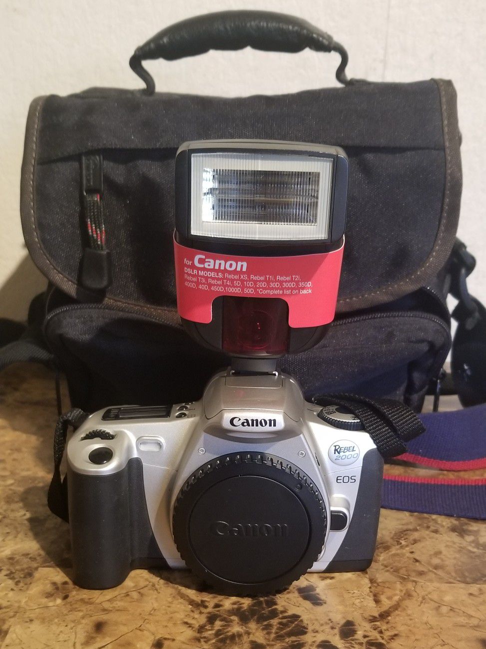 Canon Rebel 2000 EOS 35mm Film Camera Body, EOS Strap, and lens cover, flash , and bag!