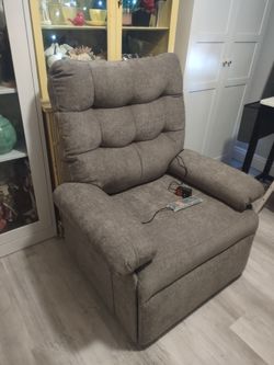 Brand new Mcombo power lift recliner. Retail $800