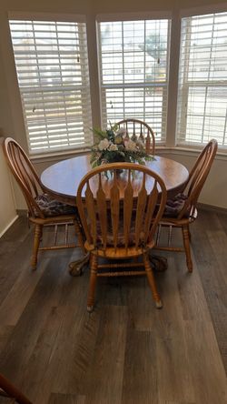 Oak dining table and chairs