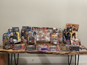 Huge WWE wrestling items   New in package/figurines