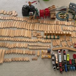 Collection of wooden trains and tracks