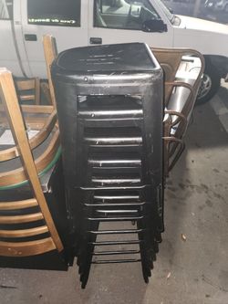 Black Metal Stacking Chairs Set, Brown metal stacking chairs, green cushion solid wood frame chairs