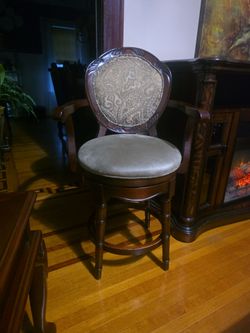 Ornate Wood Swivel Bar Stool with Arms