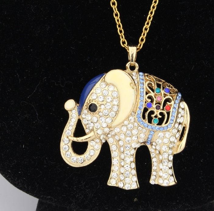 Elephant Pendant with Blue and Multi Color Austrian Crystal in Gold Tone ION-plated 24 inch chain. A little mar from manufacturing see picture