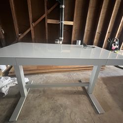 Used Glass standing desk from Costco