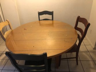 Round light brown dinner table