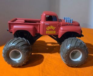 Monster Jam Grave Digger Red Monster Truck Diecast Toy 1:24 Scale.