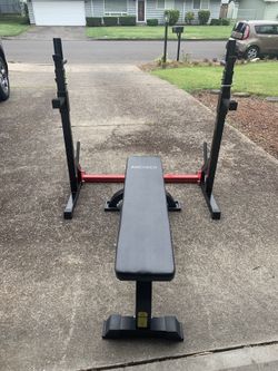 Squat rack with benchpress-also for dips and bench pressing brand new never used retails for $200