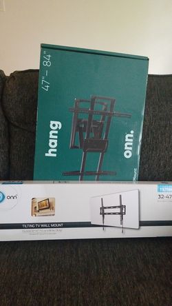 On hang tv stand never used in box 47" to 84" tv and 32 " to 47"