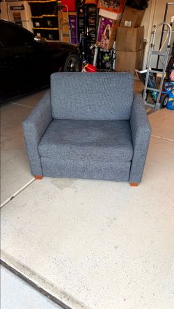 Chair with pull out bed