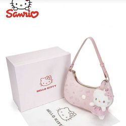 Hermosos bolsos de Hello kitty con su Charm Incluido