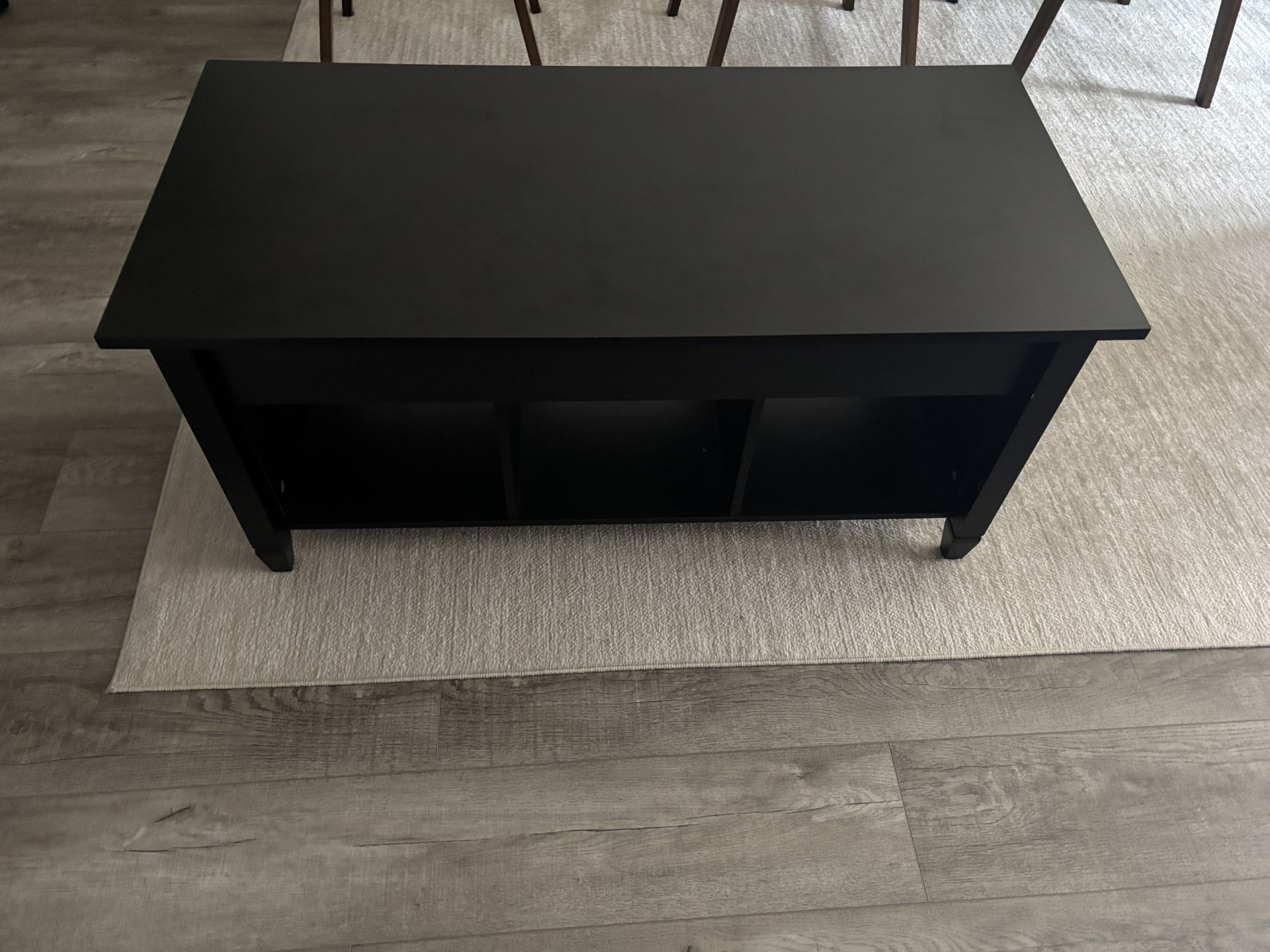 Black coffee table with storage lift top