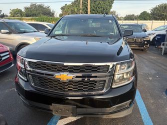 Black Chevrolet Tahoe / Suburban SUV